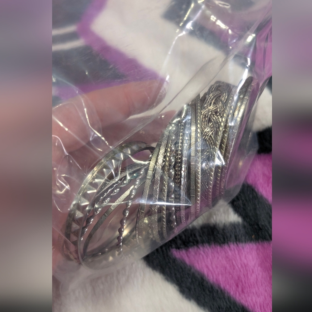 Bag Of Assortwd Silver Toned Bracelets Costume Jewelry